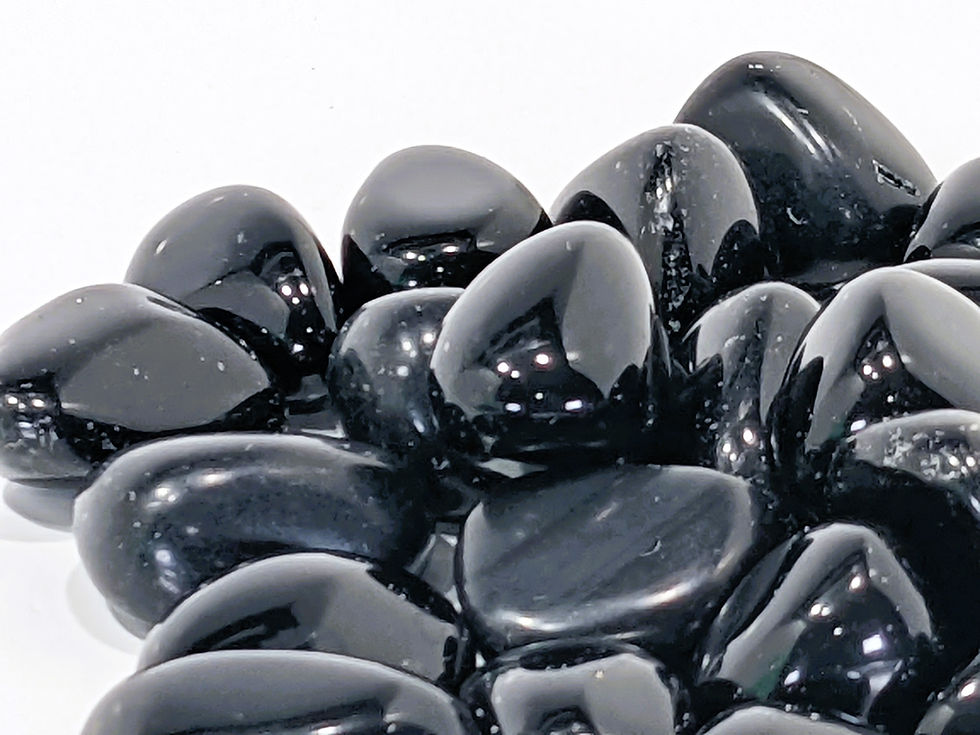 Thumbnail: Black Obsidian Tumble with smooth, glassy texture, known for its protective and grounding qualities. At jujujems.
