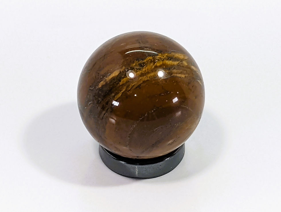Thumbnail: Tiger Iron crystal sphere with rich red, gold, and dark metallic bands.