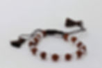 Adjustable clear quartz and Rudraksha beaded bracelet with tassles