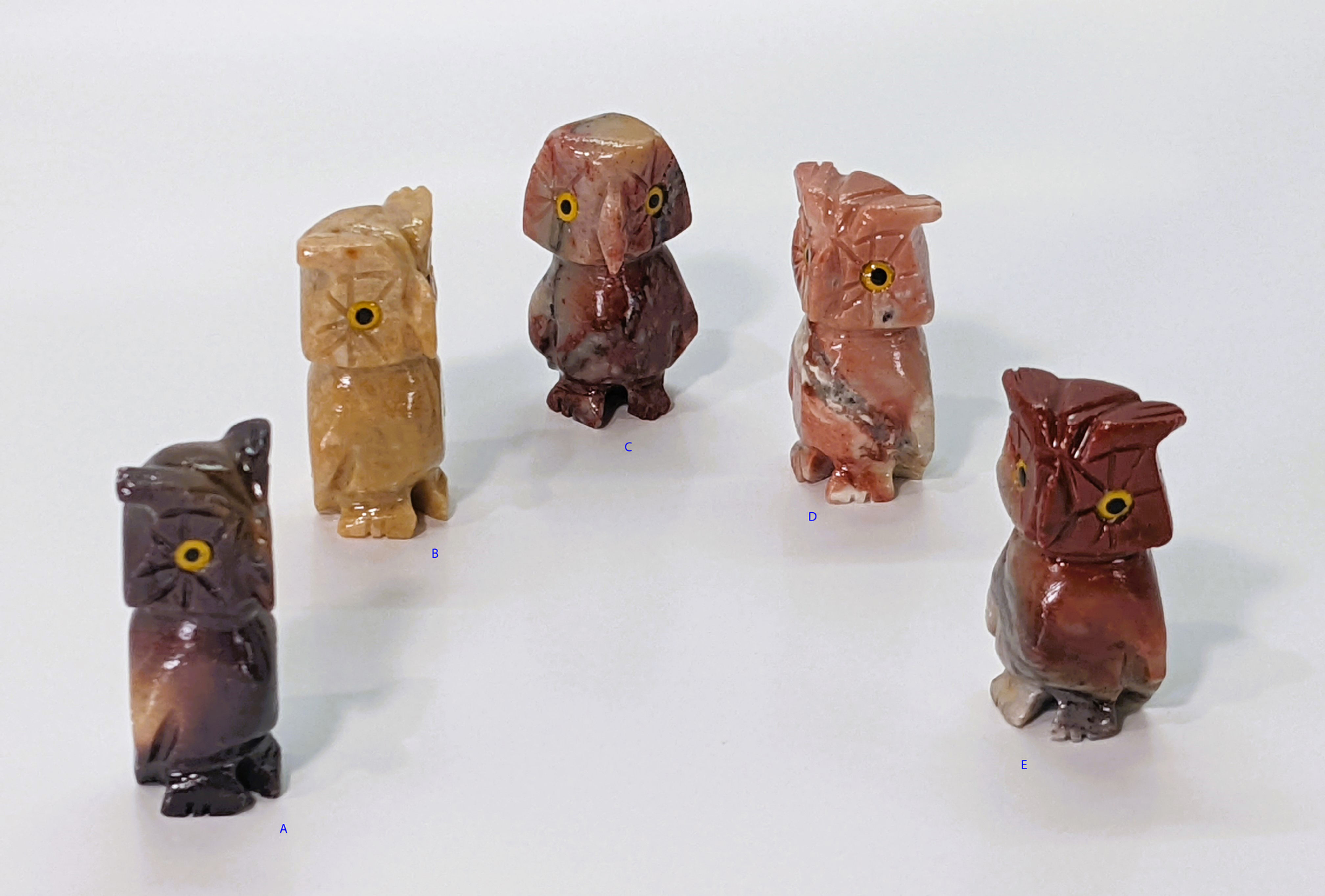 Pocket-sized soapstone owl carving, representing wisdom, focus, and mental clarity.