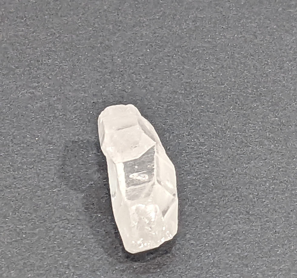 Thumbnail: Raw Lemurian Crystal specimen with natural, unpolished growth lines.