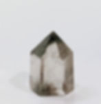 rden Quartz stone with natural inclusions that mimic a miniature mossy landscape.
