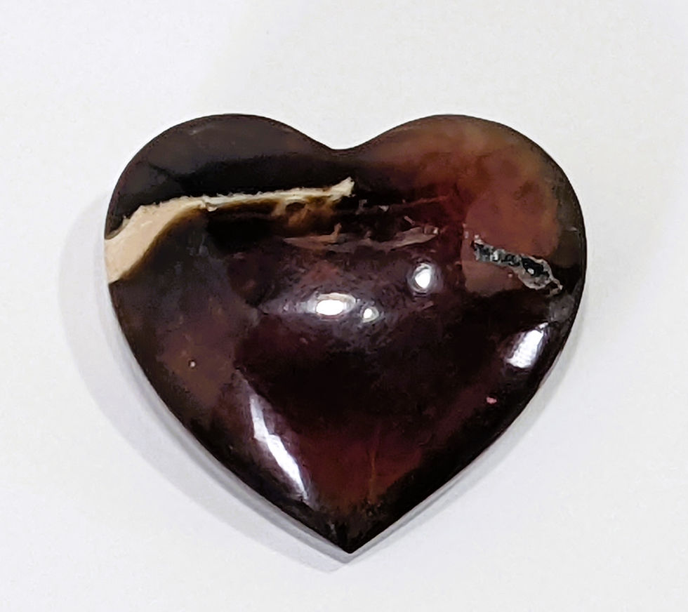Thumbnail: Polished Amber mini hearts, radiating soft golden light with unique fossilized patterns and a smooth texture.