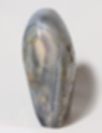 Thumbnail: Banded agate with distinctive striped patterns, known for enhancing stability and grounding. At jujujems.