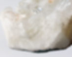 Apophyllite and Stilbite specimen featuring intricate crystal formations and a shimmering surface.