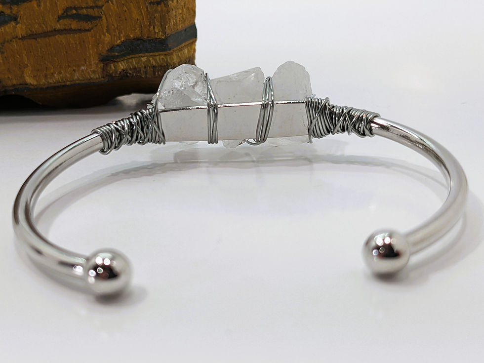 Thumbnail: Clear quartz rough cuff bracelet with 18k white gold with three quartz crystals.