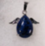 Lapis lazuli with deep blue tones and golden flecks of pyrite, known for promoting wisdom, truth, and enhancing intuition