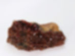 Red-orange Vanadinite crystals on matrix