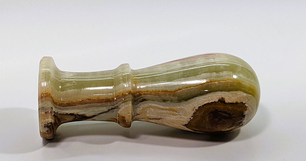 Thumbnail: Elegant onyx mortar and pestle with distinctive stone variations, perfect for culinary and metaphysical needs.