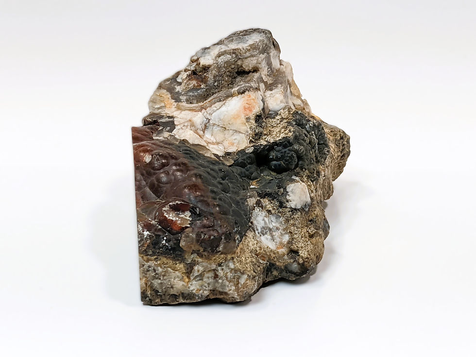 Thumbnail: Sliced Fire Agate showing colorful Agate within natural matrix