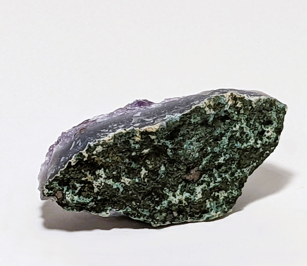 Thumbnail: Amethyst crystal with rich purple tones, known for calming energy and spiritual clarity. At jujujems.