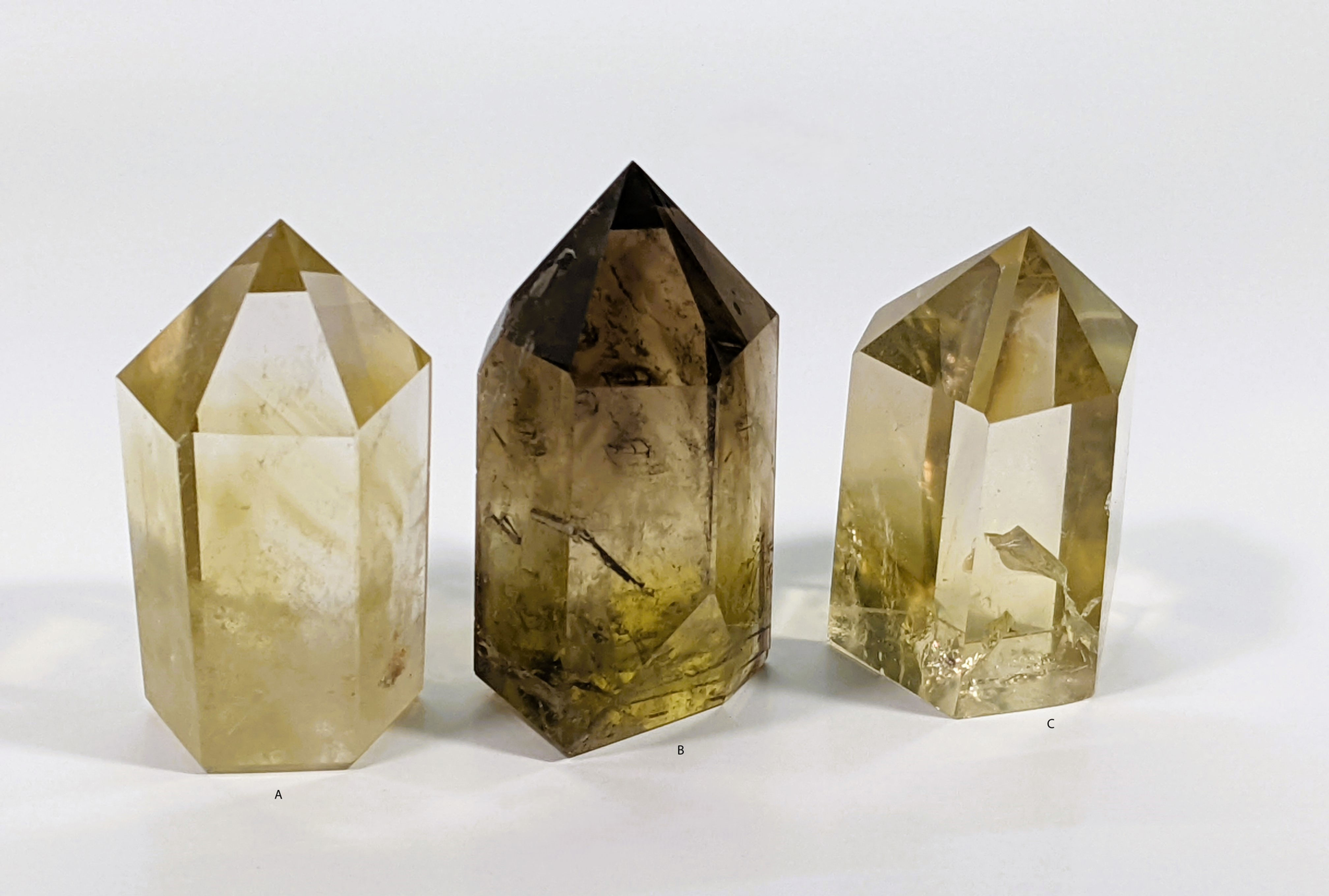 Smoky Citrine with a blend of smoky brown and golden hues, known for grounding and abundance-attracting properties. jujujems