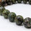 Thumbnail: Rose Quartz rough, Rhodonite tower, Dragon Bloodstone bracelet, Prehnite, and Malachite tumble