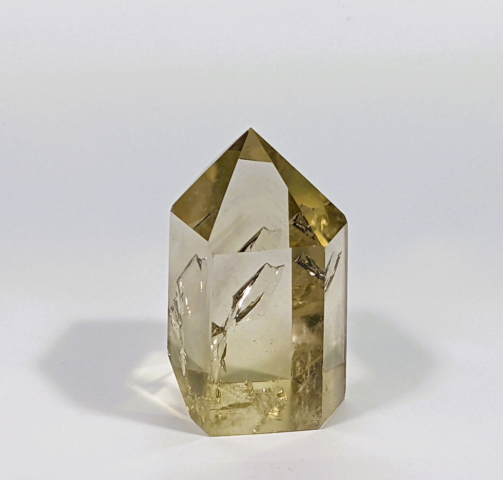 Thumbnail: Smoky Citrine with a blend of smoky brown and golden hues, known for grounding and abundance-attracting properties. jujujems