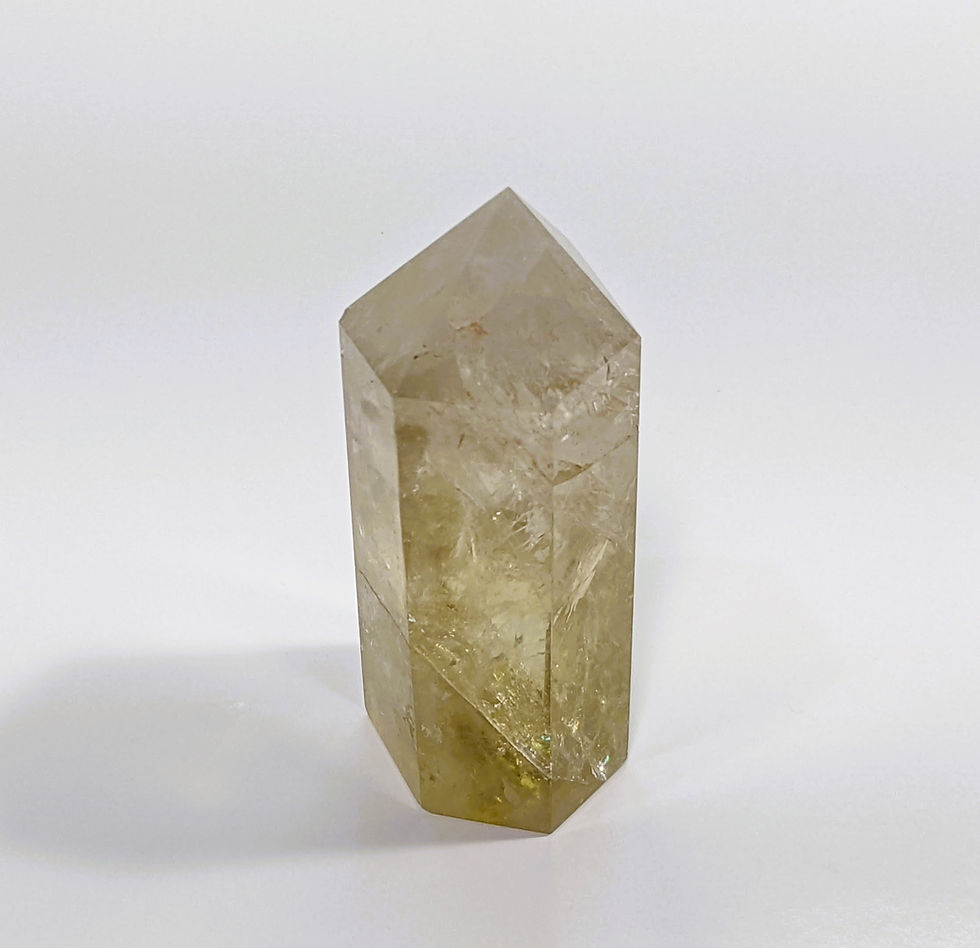 Thumbnail: Smoky Citrine with a blend of smoky brown and golden hues, known for grounding and abundance-attracting properties. jujujems