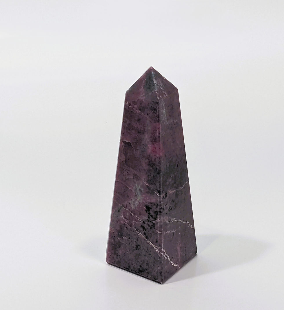 Thumbnail: Rhodonite Obelisk with pink and black veining, manganese-rich silicate, symbolizing grounding, emotional healing, and heart-c