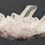 Thumbnail: Clear quartz cluster with translucent, lustrous druzy crystals.
