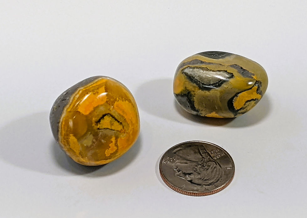 Bumblebee Jasper with striking yellow, black, and orange patterns, known for its energizing and motivational properties.