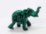 Malachite elephant carving from Congo with deep green swirls