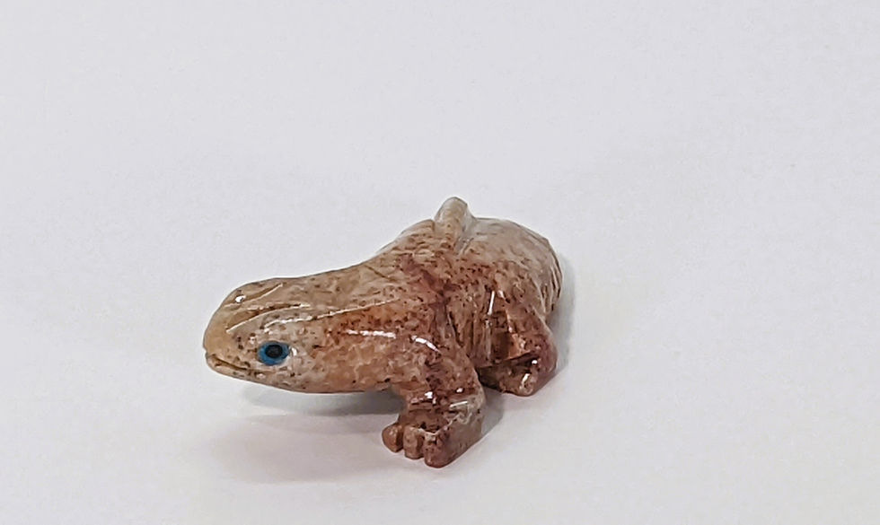 Thumbnail: Miniature soapstone salamander carving, representing transformation and inner fire.