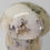 Thumbnail: Polished Dendritic Opal mushroom with black dendrite inclusions across creamy white stone.