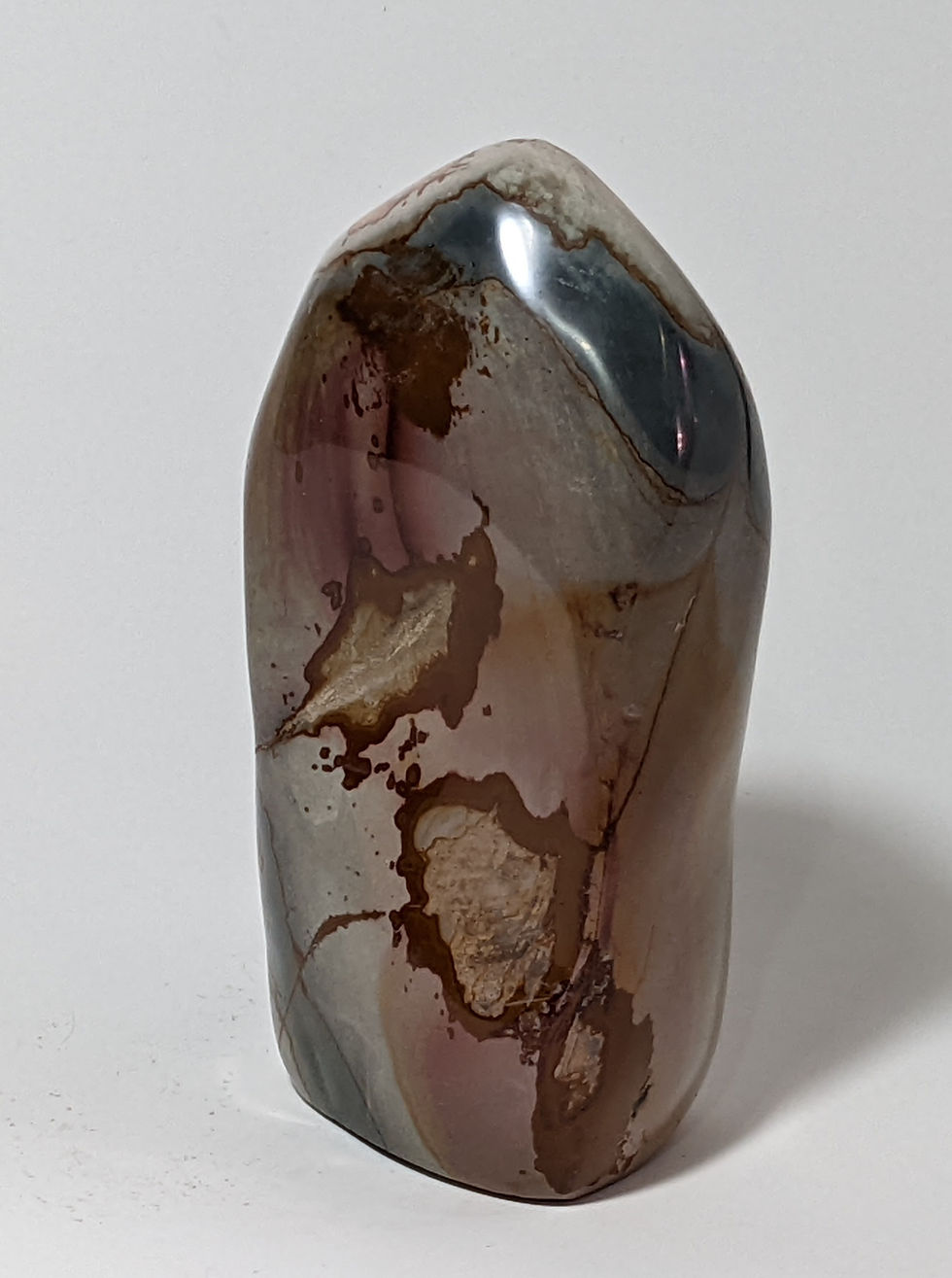 Polychrome Jasper freeform stone with organic, flowing patterns.