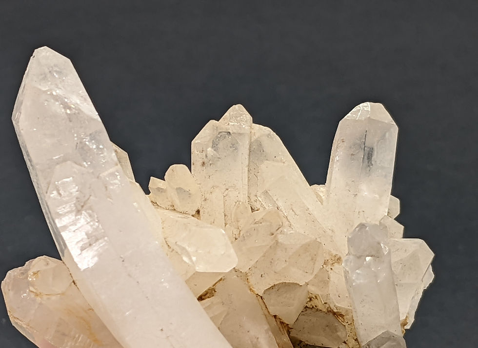 Thumbnail: Raw clear quartz cluster with bright, radiant tips.