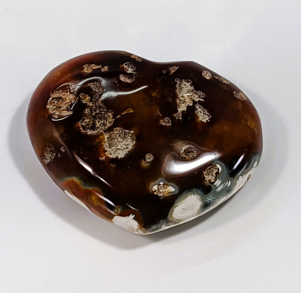 Thumbnail: Hand-carved Flower Agate heart showing delicate blossom-like inclusions