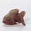 Thumbnail: Mini soapstone piranha carving, symbolizing strength, resilience, and protection.