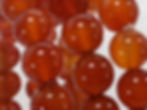 Carnelian Bracelet with vibrant orange-red hues, known for its energizing and motivating properties. At jujujems.