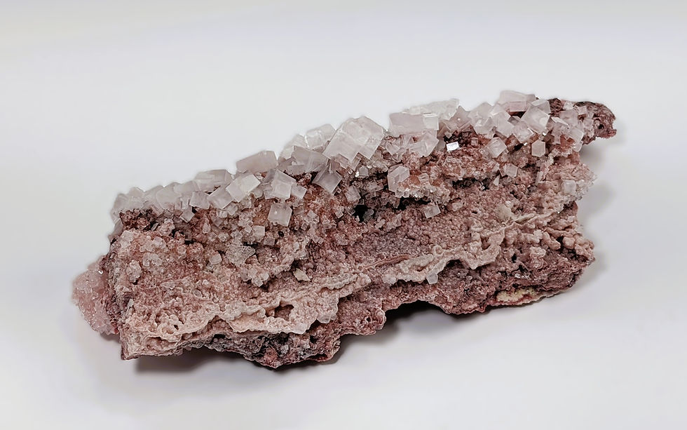 Thumbnail: natural pink halite crystal with soft color and cubic structure
