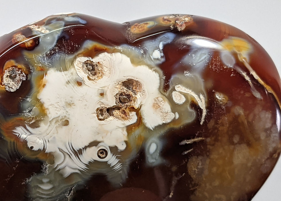 Thumbnail: Hand-carved Flower Agate heart showing delicate blossom-like inclusions