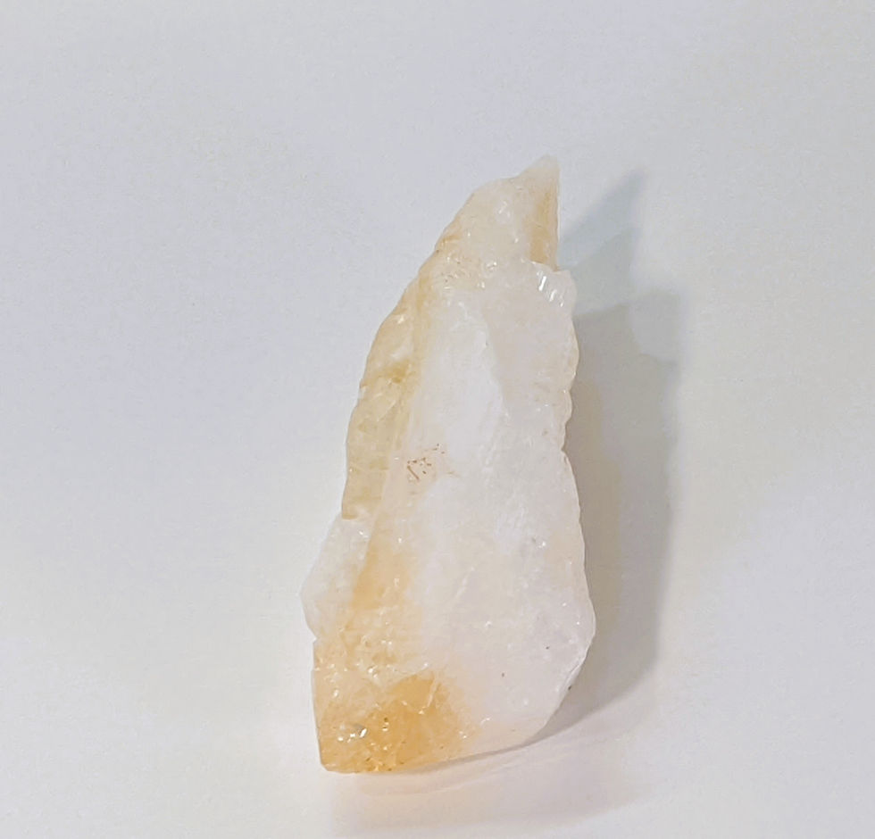 Thumbnail: Citrine with warm golden hues, known for its energizing and abundance-attracting properties. Available at jujujems.