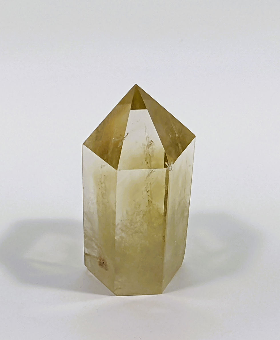 Thumbnail: Smoky Citrine with a blend of smoky brown and golden hues, known for grounding and abundance-attracting properties. jujujems