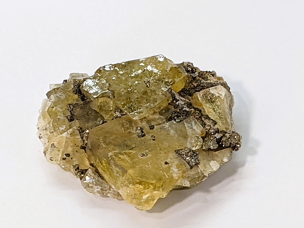 Thumbnail: Yellow Fluorite crystal with sparkling Pyrite inclusions, raw mineral specimen.