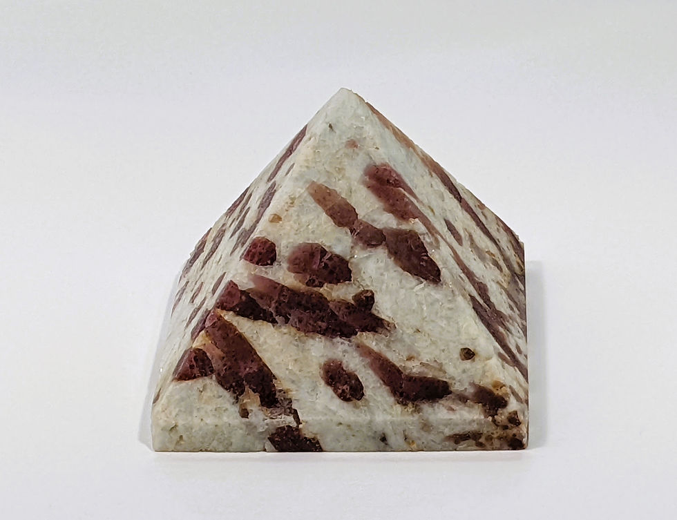 Thumbnail: Polished Pink Tourmaline pyramid, symbolizing compassion and balance.