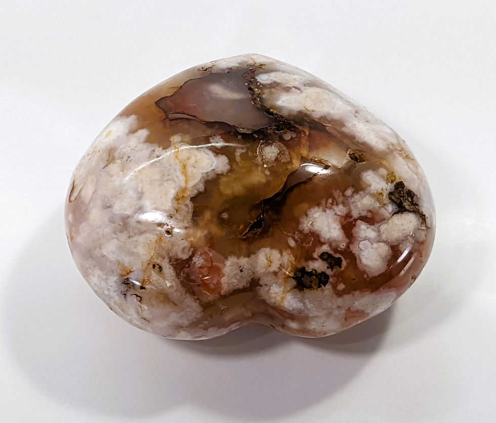 Thumbnail: Flower Agate heart carving symbolizing growth, harmony, and inner peace