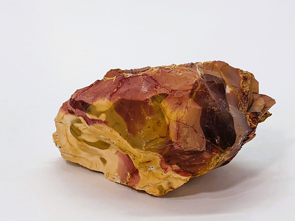 Unpolished Mookaite with vibrant banding.