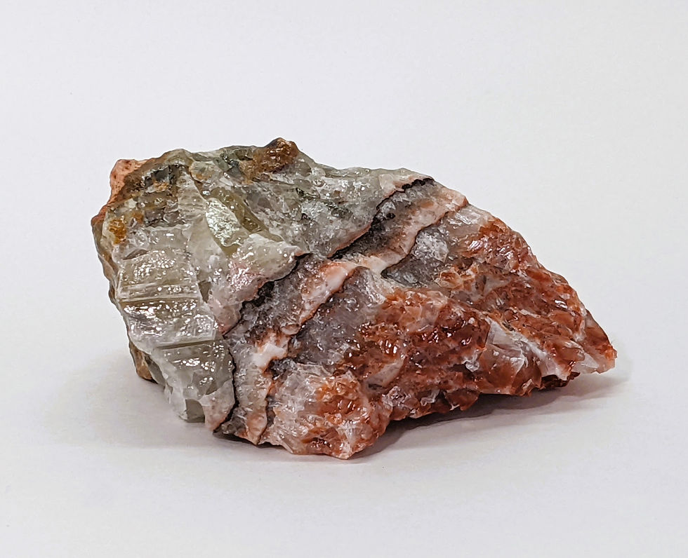 Thumbnail: Tricolor Apache Calcite stone with rugged, multicolored earthy bands.