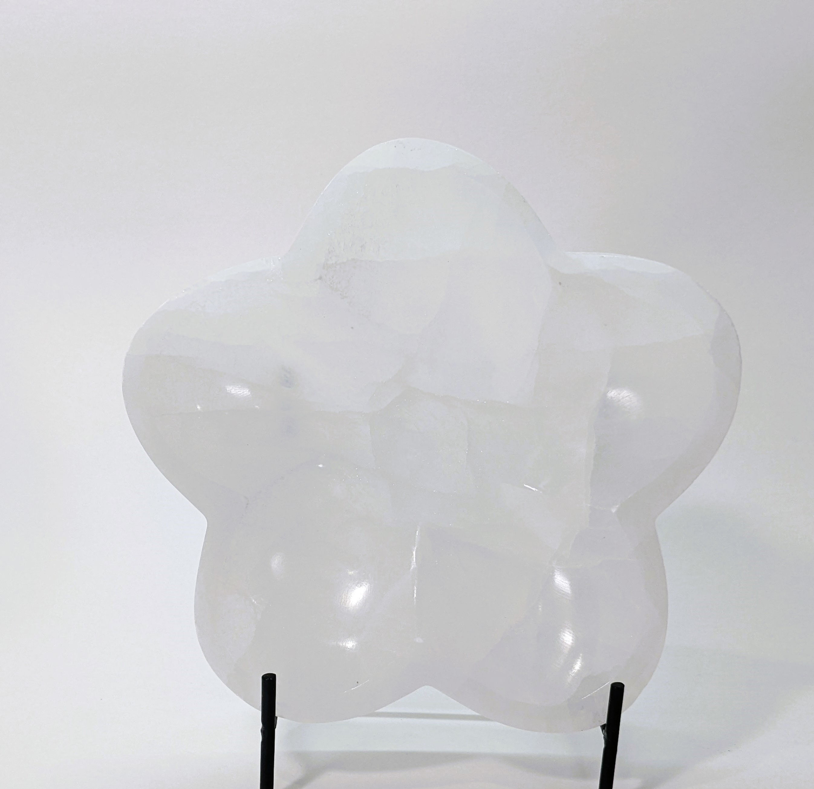 Polished Selenite bowl shaped like a blooming flower with natural striations.
