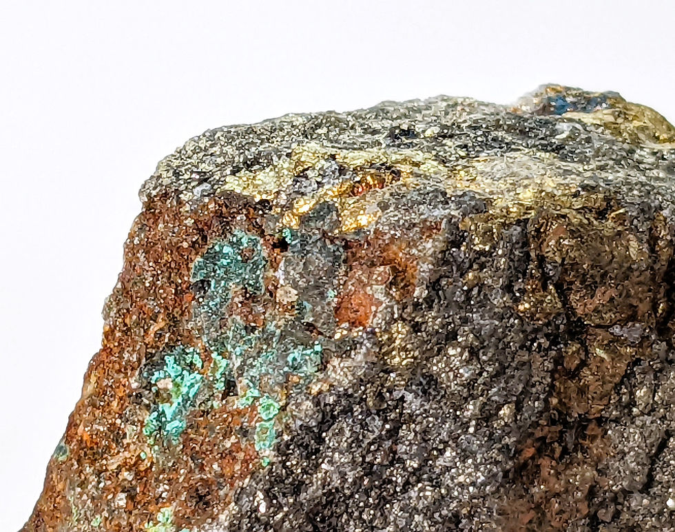 Thumbnail: Rough mineral specimen featuring Pyrite, Chalcopyrite, and Bornite with metallic and iridescent hues.