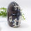 Thumbnail: Sunstone rough point, Orca Agate, Black Agate point, Carnelian bracelet, and Honey Calcite