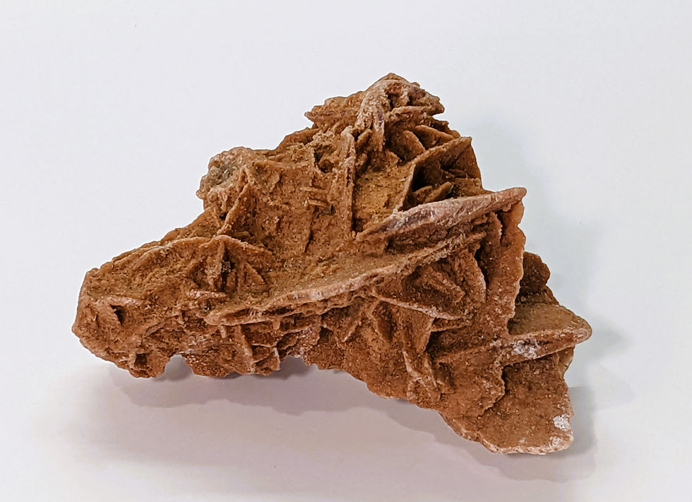 Thumbnail: Barite Sand Crystal showing layered sandy formations.