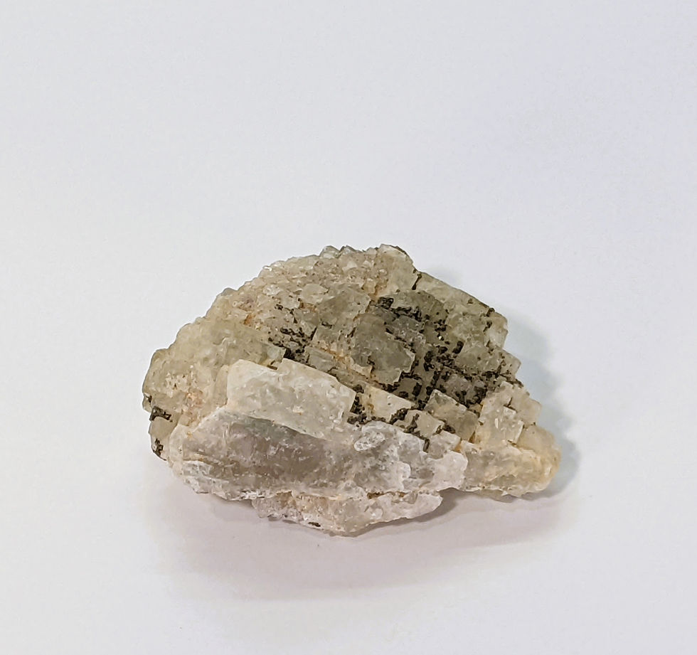 Thumbnail: Natural Calcite specimen featuring Pyrite crystals embedded in creamy white formations.