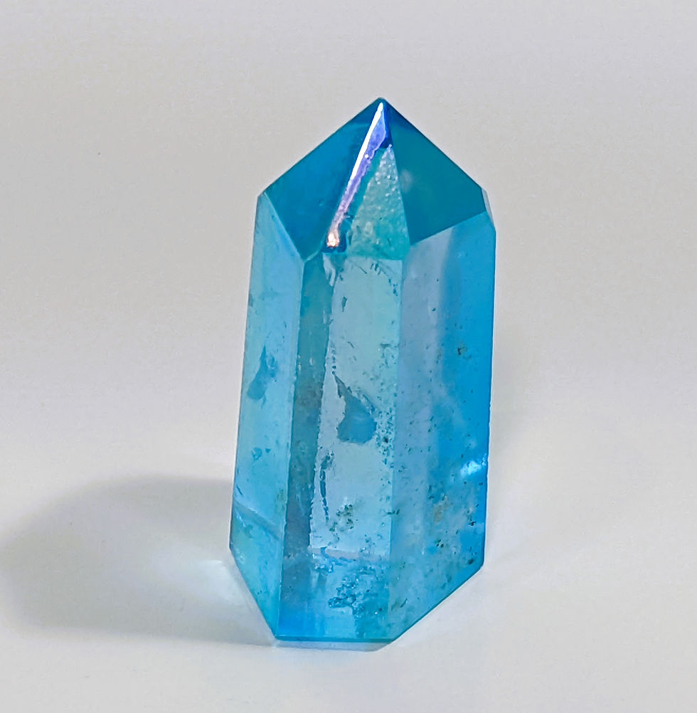 Thumbnail: Aqua aura crystal with shimmering blue hues, known for enhancing communication and clarity. At jujujems.