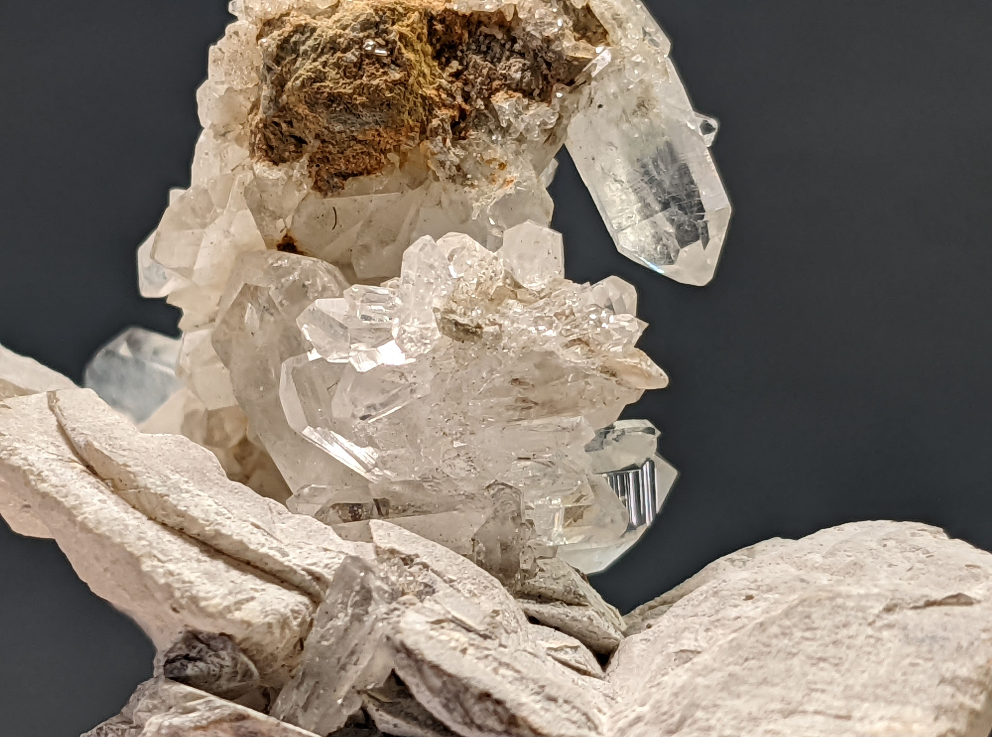 Lustrous clear quartz crystal cluster with sparkling facets.