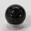 Thumbnail: Natural Nuumite crystal sphere showcasing shimmering dark patterns and reflective mineral highlights.