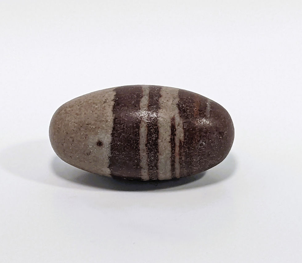 Thumbnail: Shiva Lingam stone symbolizing balance and spiritual harmony