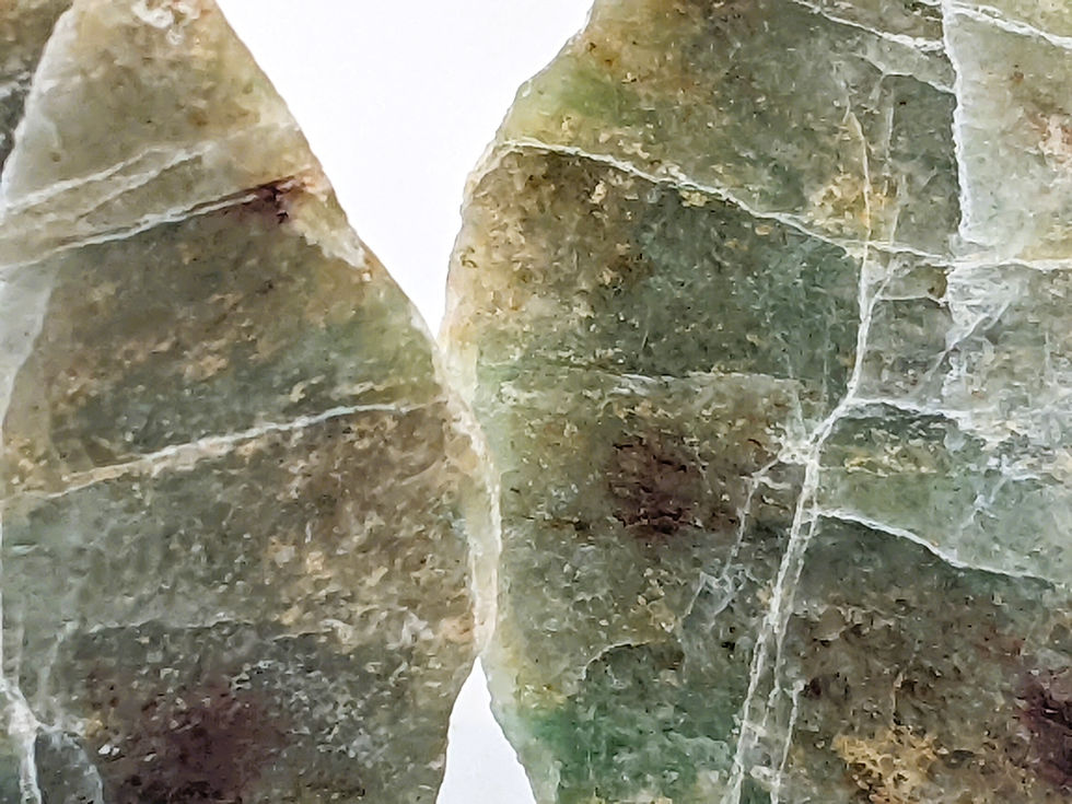 Thumbnail: Polished Nephrite Jade specimen halves.