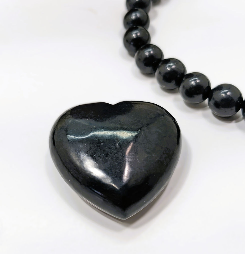 Thumbnail: Shungite bracelet, pyramids, pillows, mini hearts, Petrified Wood